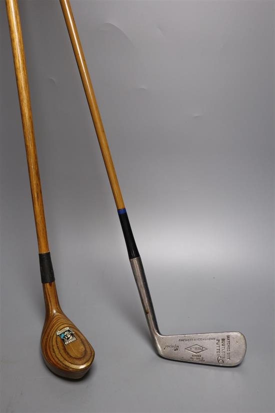 A vintage Halley St Andrews laminated hickory shafted putter and a Pin-hi brand putter with faux wood steel shaft